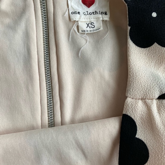 Cream and Black Floral Mini Dress with Cut out sides, sinch waist and skirt - Picture 4 of 7